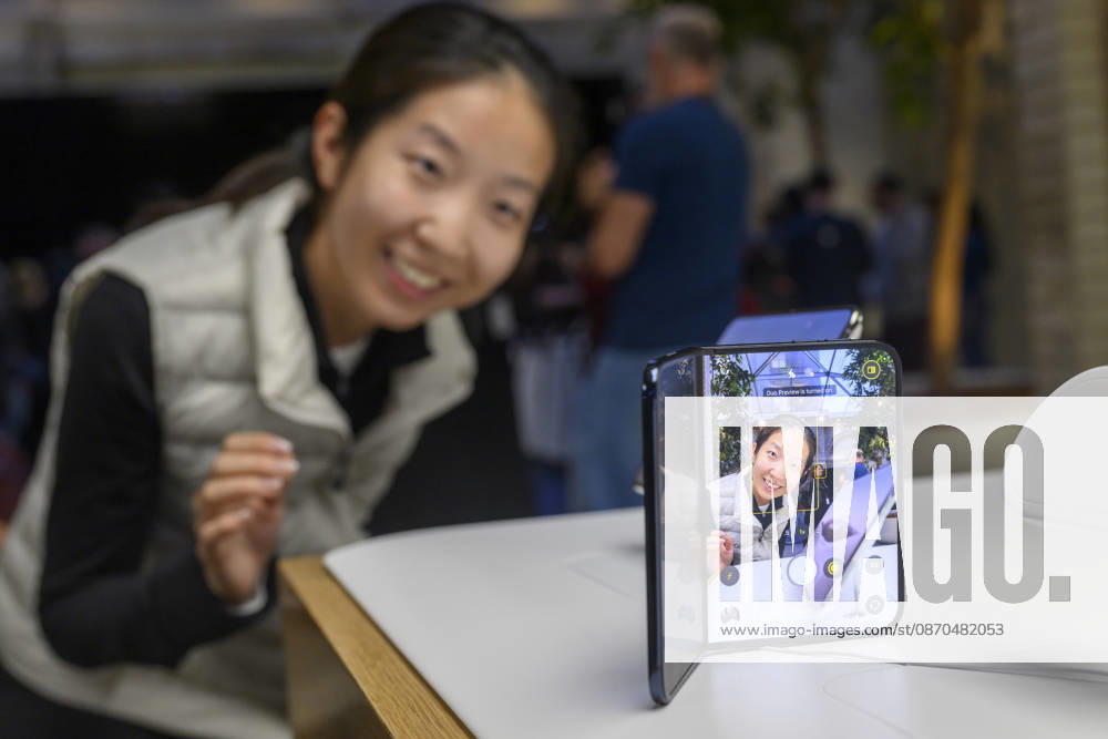 London, UK. Customers inside the Apple Covent Garden store view and buy the new Apple iPhone Duo, the companyâ€⠢s first foldable iPhone. Opened, it is the thinnest iPhone ever, with a 7.6-inch inner display that provides a large canvas for viewing content, gaming, and multitasking, and a special nano-texture finish that minimises glare for an unparalleled viewing experience. Closed, the 5.4-inch outer display delivers 90 percent of the screen area of iPhone 18 Pro in a compact, pocketable design. London UK - ZUMAl94_ 20261023_zaf_l94_013