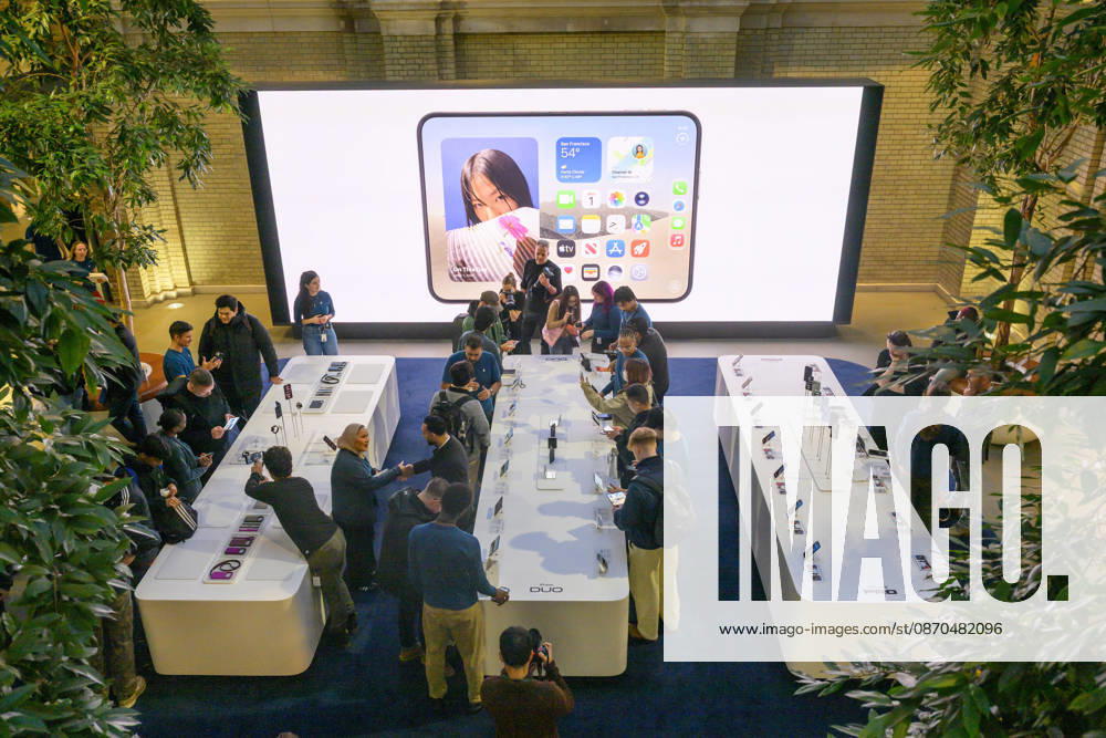 London, UK. Customers inside the Apple Covent Garden store view and buy the new Apple iPhone Duo, the companyâ€⠢s first foldable iPhone. Opened, it is the thinnest iPhone ever, with a 7.6-inch inner display that provides a large canvas for viewing content, gaming, and multitasking, and a special nano-texture finish that minimises glare for an unparalleled viewing experience. Closed, the 5.4-inch outer display delivers 90 percent of the screen area of iPhone 18 Pro in a compact, pocketable design. London UK - ZUMAl94_ 20261023_zaf_l94_017