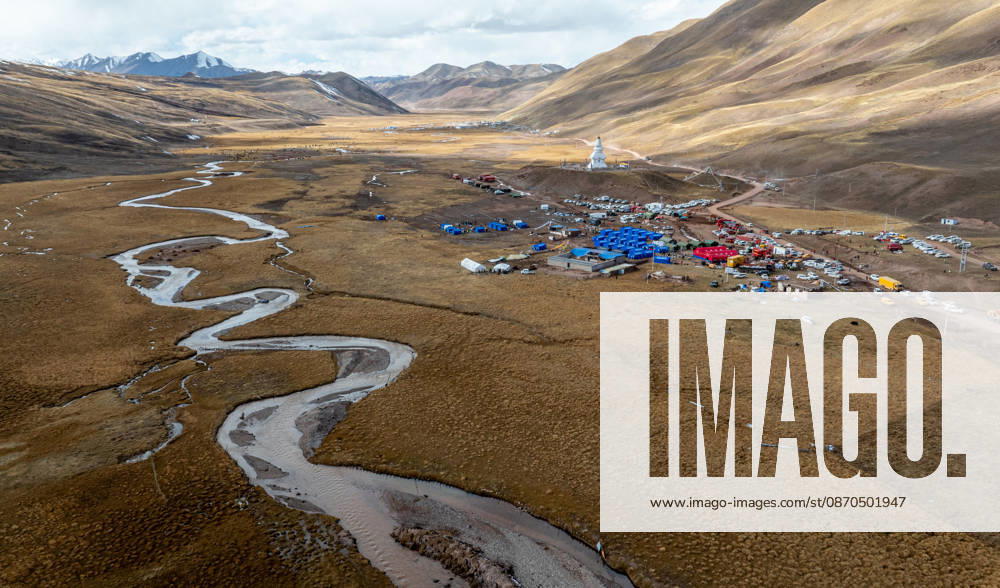 (261023) -- LHASA, Oct. 23, 2026 -- An aerial drone photo taken on Oct. 23, 2026 shows emergency tents at an earthquake-hit village in Maru Township of Baqen County, Nagqu City, southwest China s Xizang Autonomous Region. Sixteen people have been killed and 76 others are injured following a 7.0-magnitude earthquake which struck Baqen County of the city of Nagqu in southwest China s Xizang Autonomous Region at 10:33 p.m. on Thursday, local authorities said. The Ministry of Emergency Management and authorities in Xizang have mobilized resources for rescue and relief operations. ) (SpotNews) CHINA-XIZANG-NAGQU-EARTHQUAKE-RESCUE AND RELIEF (CN) TenzinxNyida