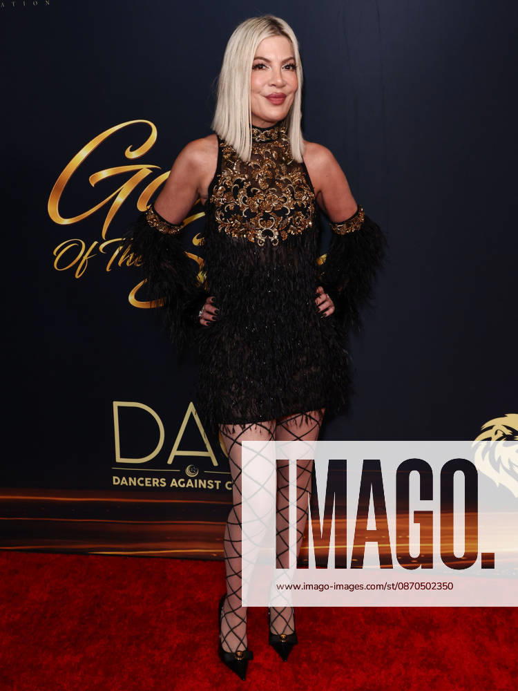 Dancers Against Cancer s Gala Of The Stars 2026 BEVERLY HILLS, LOS ANGELES, CALIFORNIA, USA - OCTOBER 22: Tori Spelling arrives at Dancers Against Cancer s Gala Of The Stars 2026 held at The Beverly Hilton Hotel on October 22, 2026 in Beverly Hills, Los Angeles, California, United States. Beverly Hills The Beverly Hilton Hotel California United States