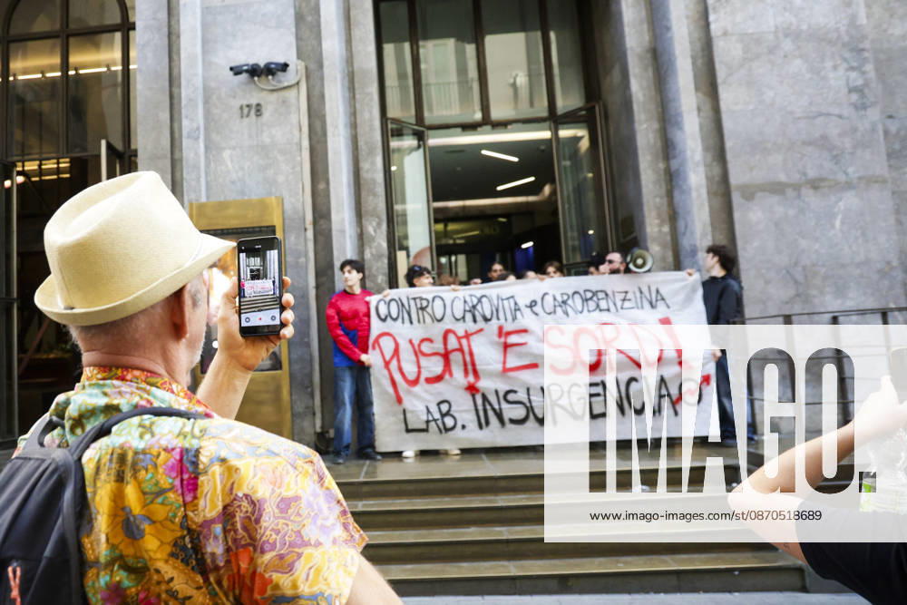 Activists Target Banks Over Cost-of-Living Crisis Activists from Insurgencia, together with the Argo and Kaos collectives, are organising a protest outside the Intesa Sanpaolo offices on Via Toledo in Naples. Some protesters are dressed as Spider-Man and are waving banners bearing the Neapolitan slogan ˜Pusate e sord!. The activists accuse the banks of continuing to make excessive profits whilst ordinary people face growing financial hardship, and criticise the Meloni government for its response to the recent disruptions to fuel and food supplies. Napoli October 23 2026, ABP17373