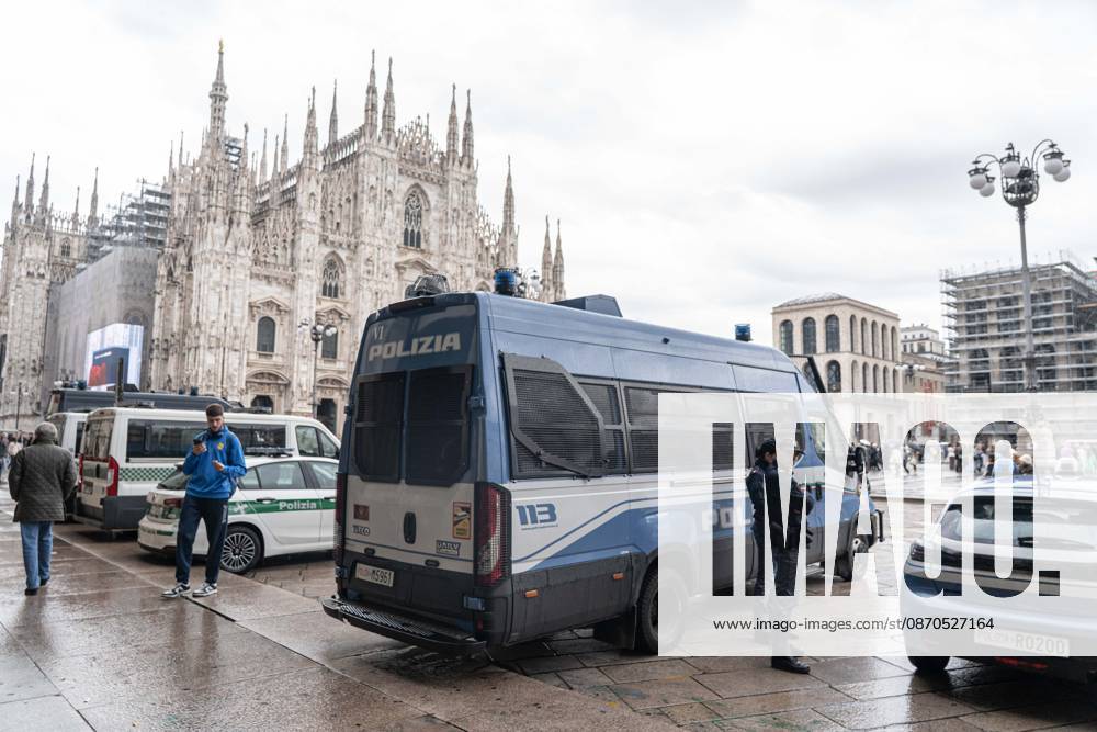 IPA90074204 - Milan, October 23, 2026. The city center is preparing for tomorrows heavily secured Saturday ahead of the march. From police and Carabinieri checkpoints at the Duomo to storefronts reinforced with panels to prevent break-ins on Via Torino.