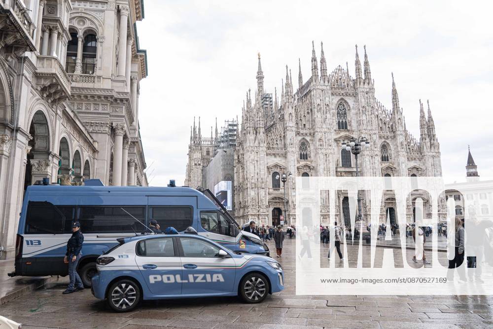 IPA90074206 - Milan, October 23, 2026. The city center is preparing for tomorrows heavily secured Saturday ahead of the march. From police and Carabinieri checkpoints at the Duomo to storefronts reinforced with panels to prevent break-ins on Via Torino.
