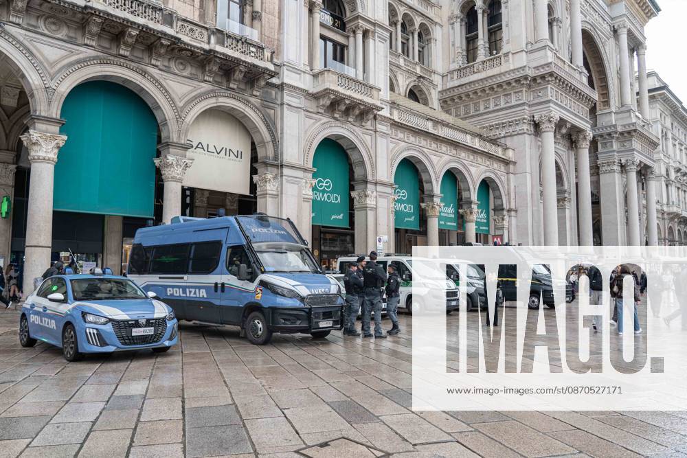IPA90074207 - Milan, 10 26 23. The city center is preparing for tomorrows heavily secured Saturday ahead of the march. From police and Carabinieri checkpoints at the Duomo to storefronts reinforced with panels to prevent break-ins on Via Torino.