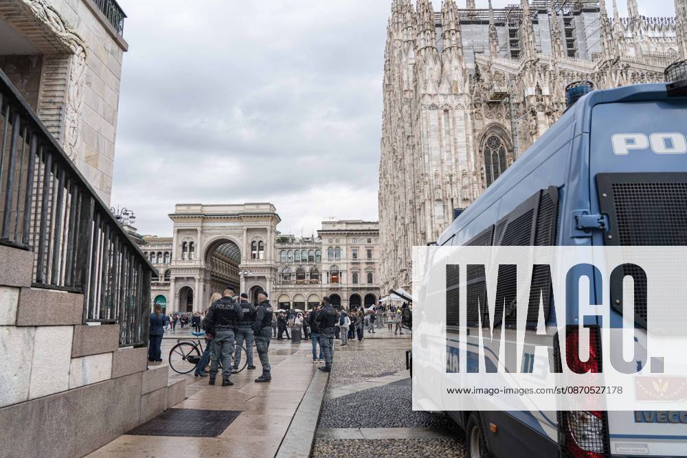 IPA90074214 - Milan, October 23, 2026. The city center is preparing for tomorrows heavily secured Saturday ahead of the march. From police and Carabinieri checkpoints at the Duomo to storefronts reinforced with panels to prevent break-ins on Via Torino.