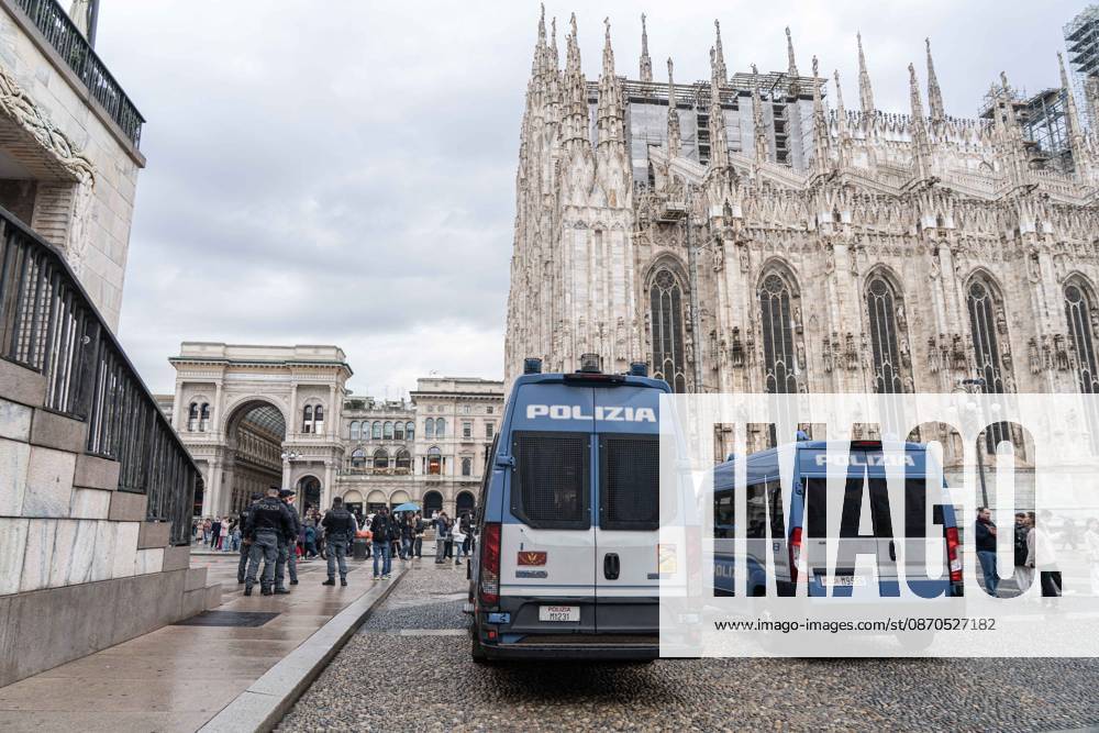 IPA90074217 - Milan, 10 26 23. The city center is preparing for tomorrows heavily secured Saturday ahead of the march. From police and Carabinieri checkpoints at the Duomo to storefronts reinforced with panels to prevent break-ins on Via Torino.