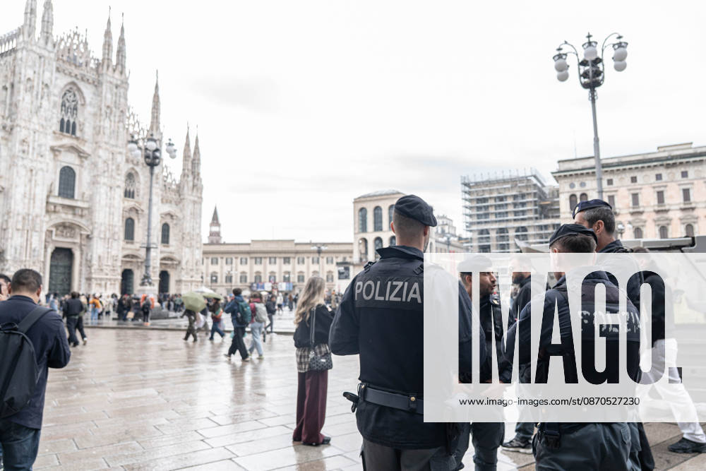 IPA90074209 - Milan, 10 26 23. The city center is preparing for tomorrows heavily secured Saturday ahead of the march. From police and Carabinieri checkpoints at the Duomo to storefronts reinforced with panels to prevent break-ins on Via Torino.