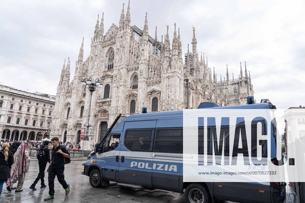 IPA90074212 - Milan, 10 26 23. The city center is preparing for tomorrows heavily secured Saturday ahead of the march. From police and Carabinieri checkpoints at the Duomo to storefronts reinforced with panels to prevent break-ins on Via Torino.
