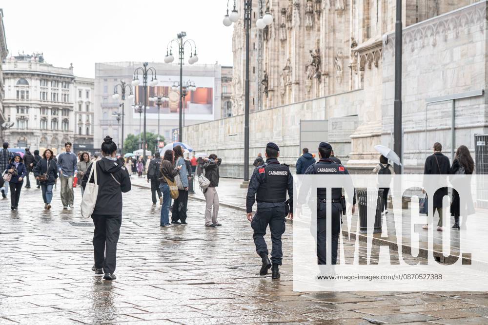 IPA90074276 - Milan, 10 26 23. The city center is preparing for tomorrows heavily secured Saturday ahead of the march. From police and Carabinieri checkpoints at the Duomo to storefronts reinforced with panels to prevent break-ins on Via Torino.