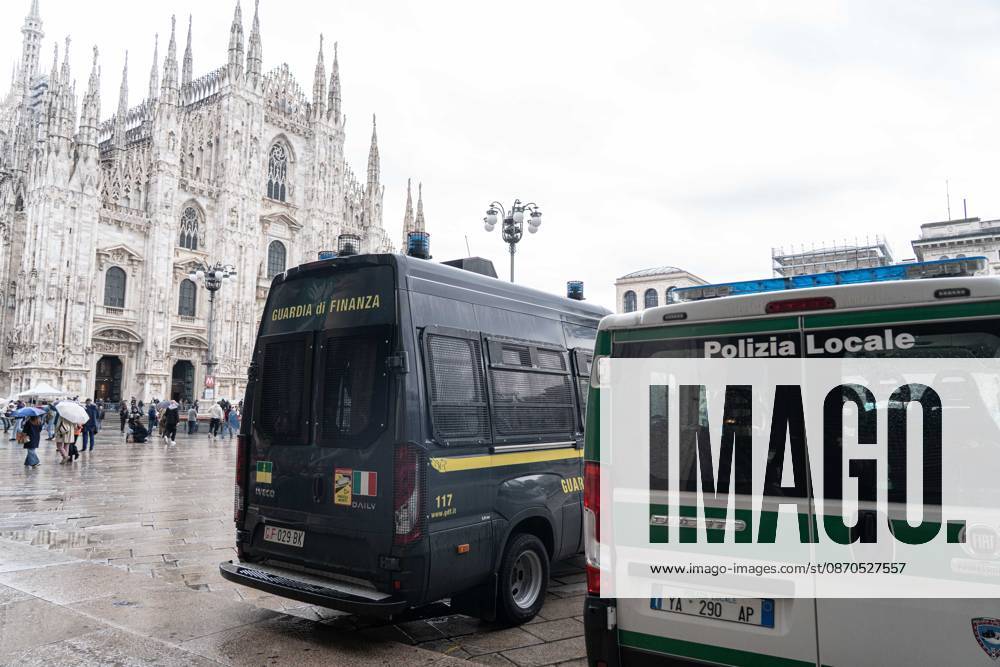 IPA90074198 - Milan, 10 26 23. The city center is preparing for tomorrows heavily secured Saturday ahead of the march. From police and Carabinieri checkpoints at the Duomo to storefronts reinforced with panels to prevent break-ins on Via Torino.