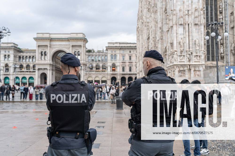 IPA90074226 - Milan, October 23, 2026. The city center is preparing for tomorrows heavily secured Saturday ahead of the march. From police and Carabinieri checkpoints at the Duomo to storefronts reinforced with panels to prevent break-ins on Via Torino.