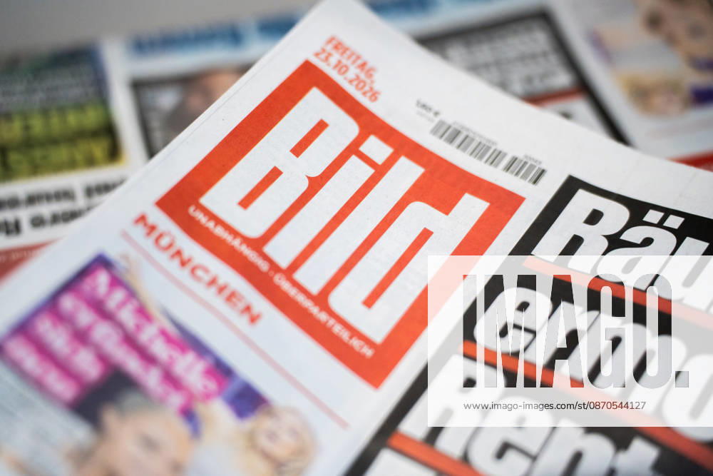 Munich, Bavaria, Germany October 23, 2026: The 2026 convention of the CSU (Christian Social Union) at the Munich Trade Fair Center. Background detail: a stack of newspapers, copies of the daily newspaper BILD published by Axel Springer Verlag