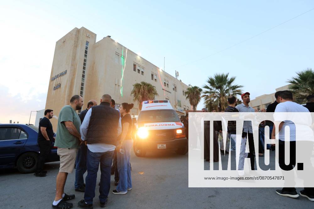 (261023) -- KARAK, Oct. 23, 2026 -- People gather outside a hospital in Karak after a shooting attack in Jordan s southern governorate of Karak, Oct. 23, 2026. Seven people were killed and 34 others injured in a shooting attack during a funeral in Jordan s southern governorate of Karak, the Jordanian Public Security Directorate said Friday. (Photo by Xinhua) JORDAN-KARAK-CHURCH SHOOTING MohammadxAbuxGhosh