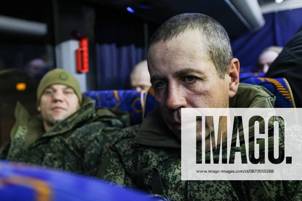 RUSSIA, MOSCOW REGION - OCTOBER 23, 2026: Russian servicemen released from Ukrainian captivity are seen in a bus. Georgy Chernyshov TASS 99833322