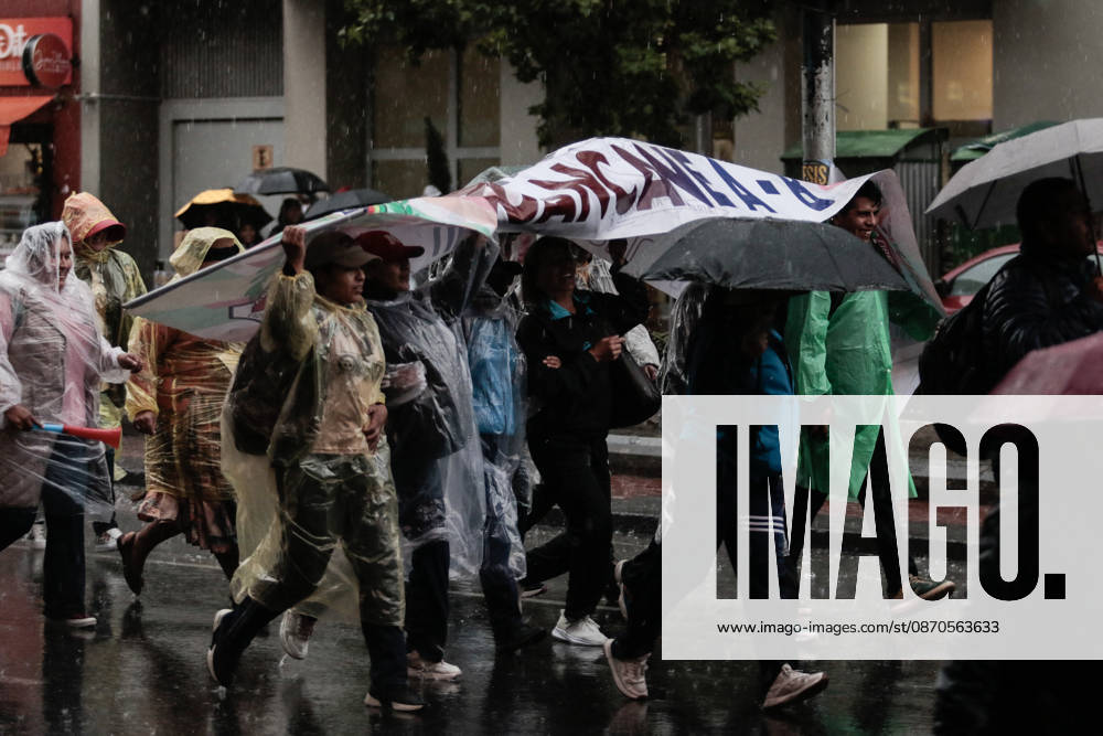 Bolivian teachers march amid the state of emergency in Bolivia LA PAZ, BOLIVIA - OCTOBER 23: Teachers shield themselves from the rain with a sign during an anti-government march amid a state of emergency in La Paz, Bolivia, on October 23, 2026. The Urban Teachers Union is holding a 24-hour nationwide strike this Friday to press a series of demands upon the national government. In La Paz, Cochabamba, Chuquisaca, and Santa Cruz, teachers are staging marches and protests, despite the state of emergency currently in effect in the country. Jorge Mateo Romay Salinas Anadolu La paz Bolivia. Editorial use only. Please get in touch for any other usage.