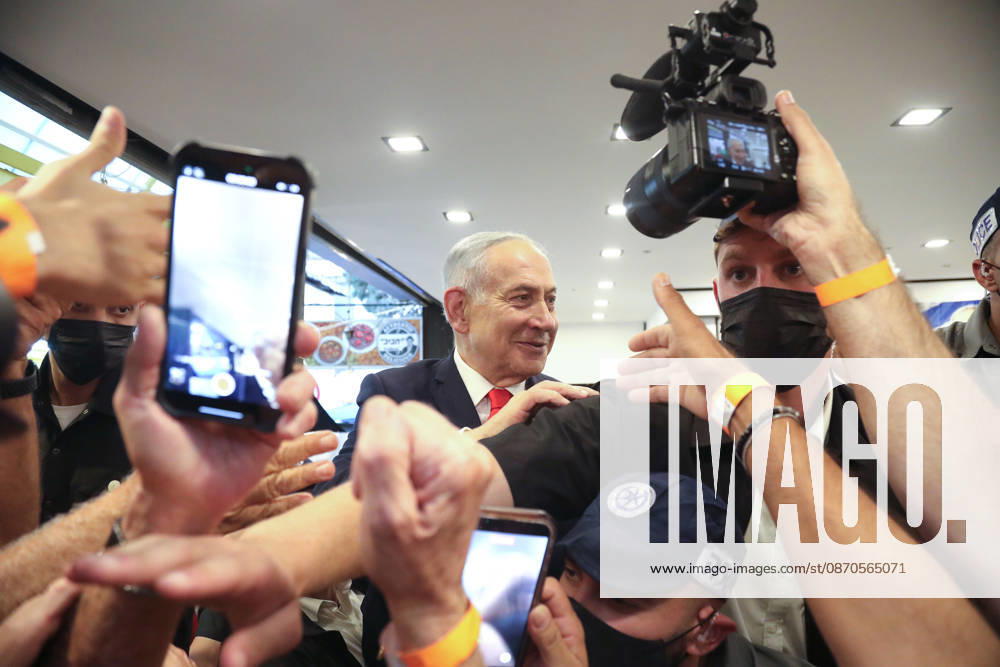 (261023) -- TEL AVIV, Oct. 23, 2026 -- Israeli Prime Minister and Likud party leader Benjamin Netanyahu visits the Hatikva Market in Tel Aviv as part of his election campaign, Oct. 22, 2026. The general elections for Israel s Knesset, the country s parliament, will be held on Oct. 27. ( via Xinhua) ISRAEL-TEL AVIV-ELECTIONS-CAMPAIGN GideonxMarkowicz JINI