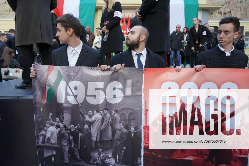 Budapest, Hungary:Supporters of the far-right Hungarian political party Mi Hazank (Our Homeland Movement) hold a banner during a rally at Corvin Square in Budapest, Hungary, commemorating the 70th anniversary of the 1956 Hungarian Revolution. Budapest Hungary - ZUMA 20261023_int_p159_055