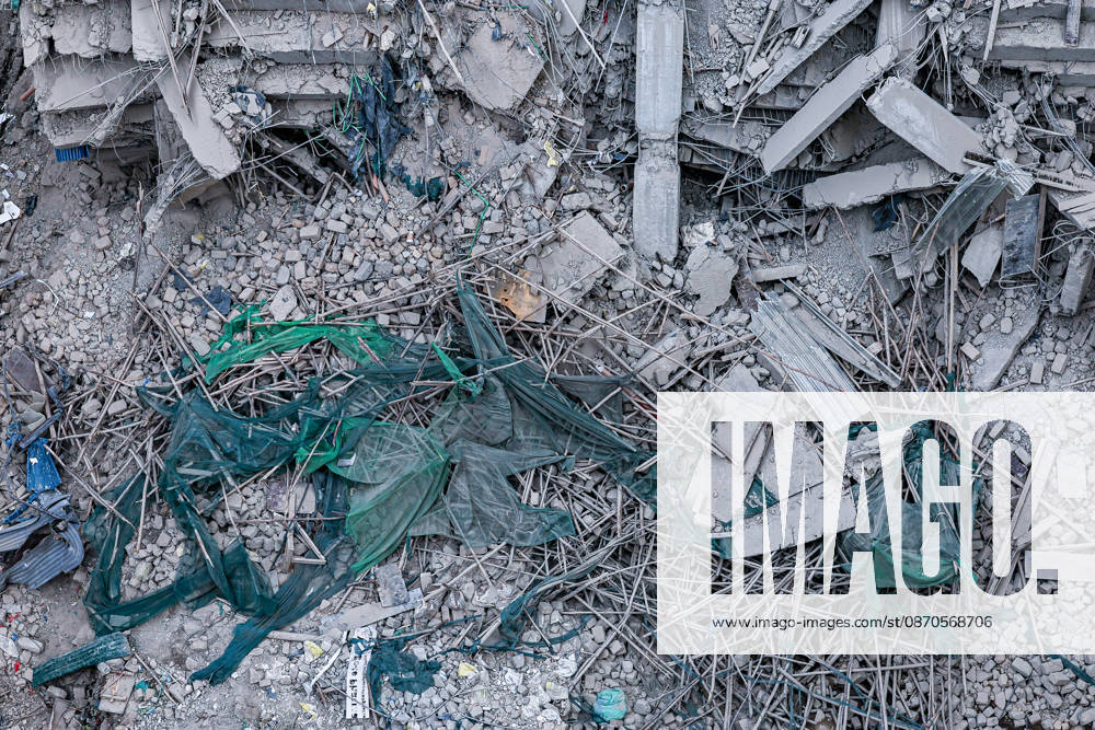 Construction materials and debris lie scattered at the site of a collapsed multi-storey building under construction in Eastleigh. Rescuers from multiple emergency response agencies conduct search and rescue operations at the site of a collapsed multi-storey building under construction in Eastleigh, Nairobi, Kenya. An unconfirmed number of people are feared trapped beneath the rubble. Nairobi Kenya - ZUMAs197 20261023_aaa_s197_297