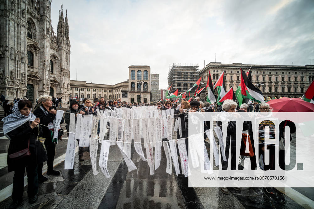 Pro-Palestinian associations protest with a flashmob to demand the release of Palestinian prisoners in Italian and Israeli jails in Piazza Duomo, Milan, on October 23, 2026. Milan Italy - ZUMAa289 20261023_zia_a289_469