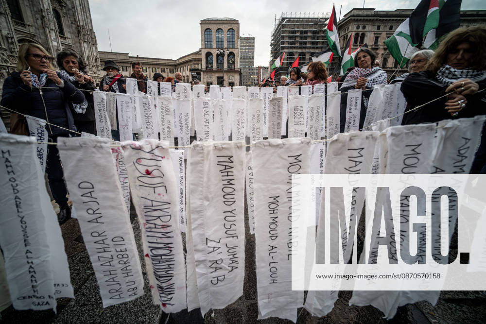 Pro-Palestinian associations protest with a flashmob to demand the release of Palestinian prisoners in Italian and Israeli jails in Piazza Duomo, Milan, on October 23, 2026. Milan Italy - ZUMAa289 20261023_zia_a289_471