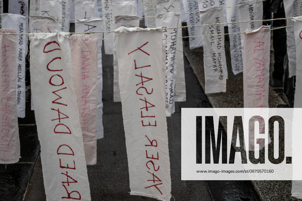 Pro-Palestinian associations protest with a flashmob to demand the release of Palestinian prisoners in Italian and Israeli jails in Piazza Duomo, Milan, on October 23, 2026. Milan Italy - ZUMAa289 20261023_zia_a289_473