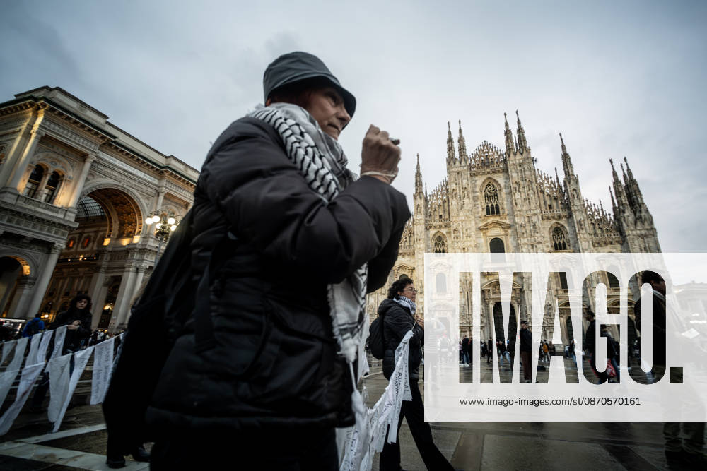 Pro-Palestinian associations protest with a flashmob to demand the release of Palestinian prisoners in Italian and Israeli jails in Piazza Duomo, Milan, on October 23, 2026. Milan Italy - ZUMAa289 20261023_zia_a289_474