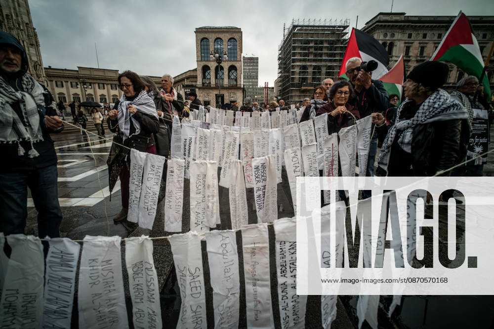 Pro-Palestinian associations protest with a flashmob to demand the release of Palestinian prisoners in Italian and Israeli jails in Piazza Duomo, Milan, on October 23, 2026. Milan Italy - ZUMAa289 20261023_zia_a289_481