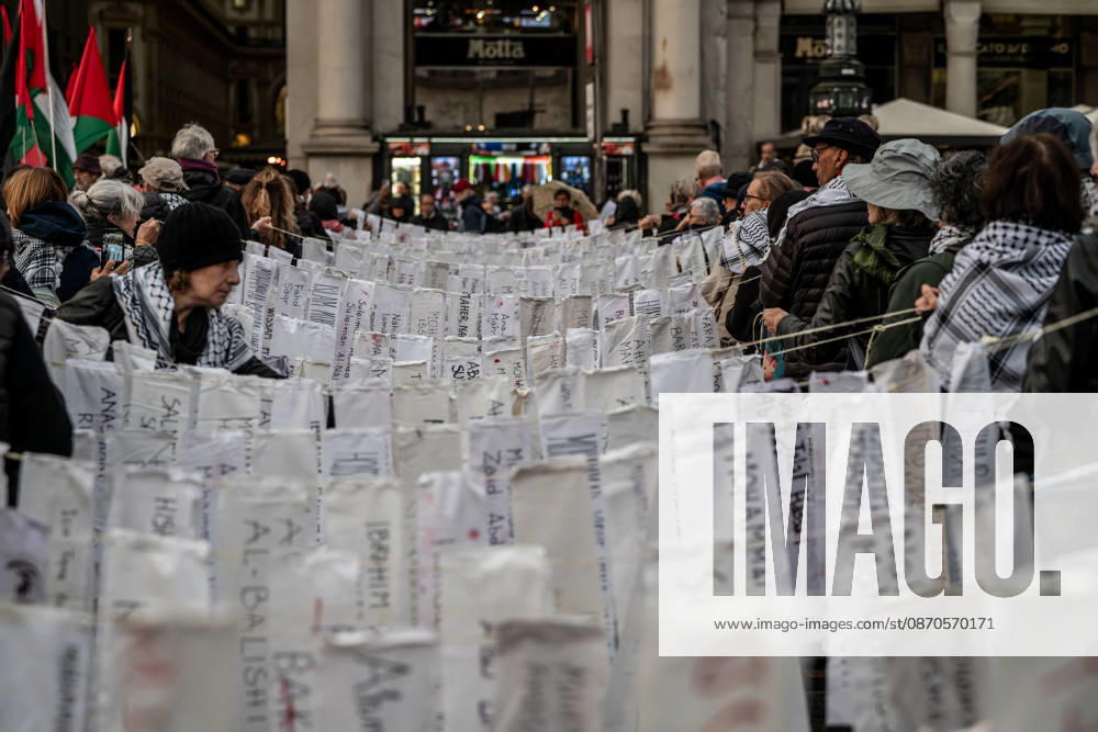 Pro-Palestinian associations protest with a flashmob to demand the release of Palestinian prisoners in Italian and Israeli jails in Piazza Duomo, Milan, on October 23, 2026. Milan Italy - ZUMAa289 20261023_zia_a289_483