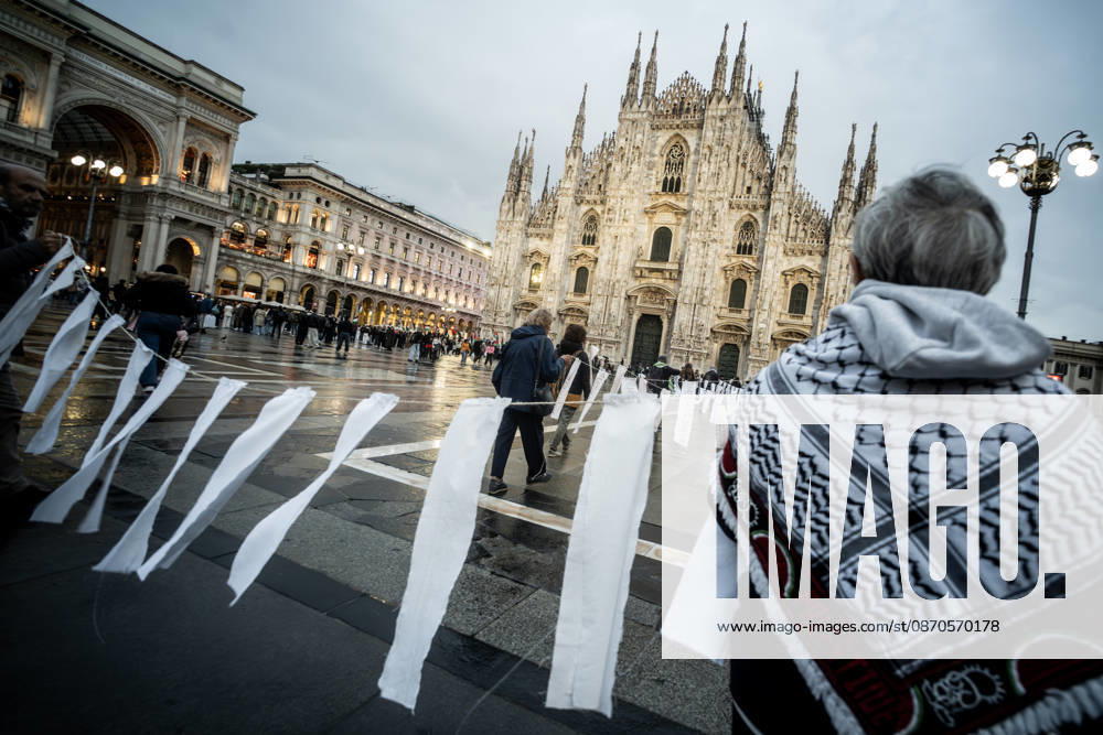 Pro-Palestinian associations protest with a flashmob to demand the release of Palestinian prisoners in Italian and Israeli jails in Piazza Duomo, Milan, on October 23, 2026. Milan Italy - ZUMAa289 20261023_zia_a289_487