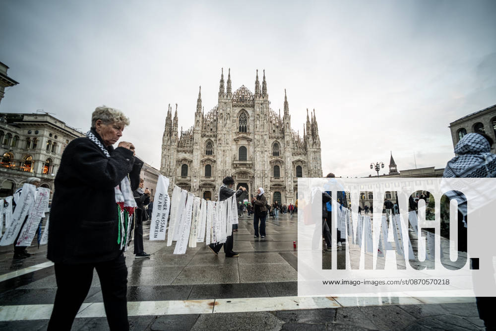 Pro-Palestinian associations protest with a flashmob to demand the release of Palestinian prisoners in Italian and Israeli jails in Piazza Duomo, Milan, on October 23, 2026. Milan Italy - ZUMAa289 20261023_zia_a289_495