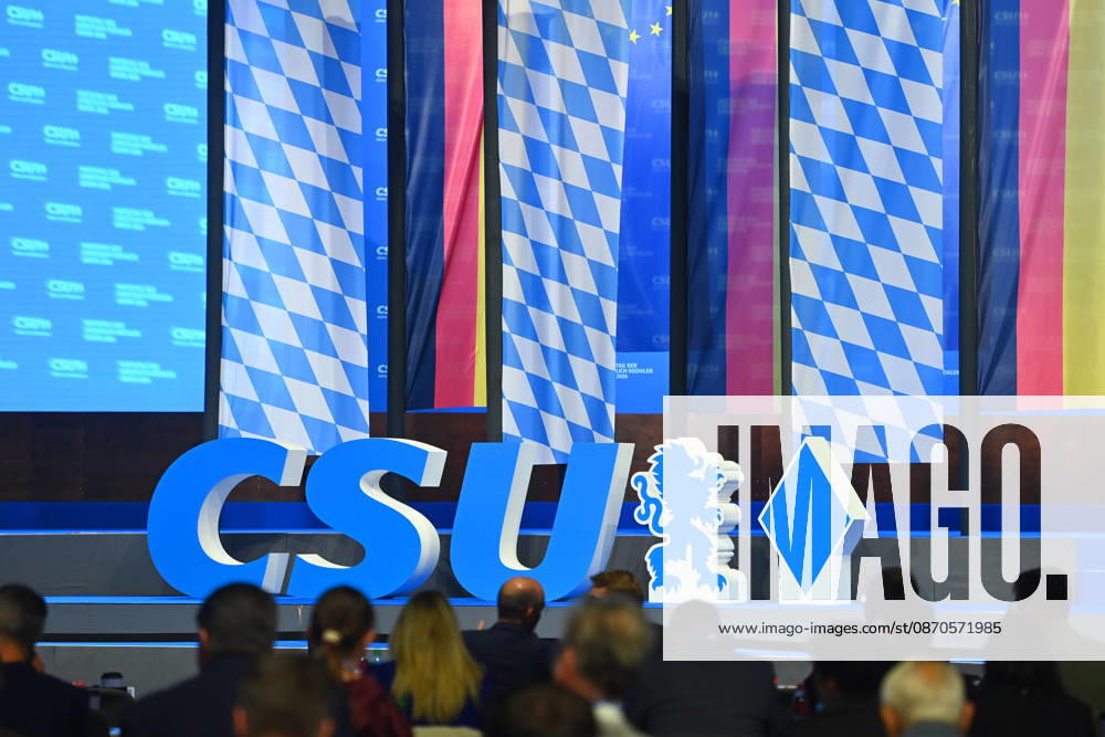 CSU logo, party logo on the podium in front of flags at the 2026 CSU Party Convention on October 23 and 24, 2026, at the Munich Trade Fair