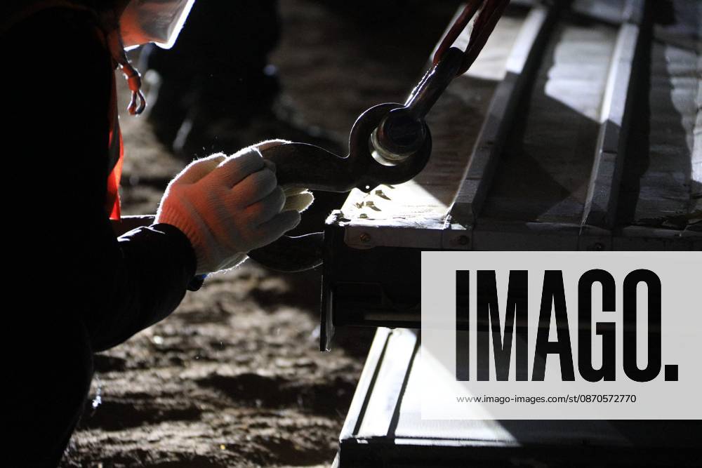 (261024) -- NAGQU, Oct. 24, 2026 -- A worker of China Railway Group Limited builds a prefabricated house at a quake-hit village in Maru Township of Baqen County, Nagqu City, southwest China s Xizang Autonomous Region, Oct. 24, 2026. The first batch of prefabricated houses has been set up on Saturday for the affected residents in a village of Maru Township, one of the hardest-hit areas near the epicenter, following a 7.0-magnitude earthquake that struck Baqen County of the city of Nagqu in southwest China s Xizang Autonomous Region at 10:33 p.m. on Thursday. (Photo by Xinhua) (SpotNews) CHINA-XIZANG-NAGQU-EARTHQUAKE-RESETTLEMENT (CN) ChenxXiaojun