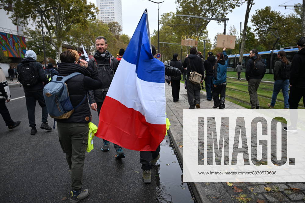 Demonstrators gather near Porte d Italie amid ongoing protests in Paris PARIS, FRANCE - OCTOBER 24: Demonstrators gather near Porte d Italie in southern Paris, chanting slogans ahead of planned marches, while security forces closely monitor the area in Paris, France, on October 24, 2026. Mouneb Taim Anadolu Paris France. Editorial use only. Please get in touch for any other usage.