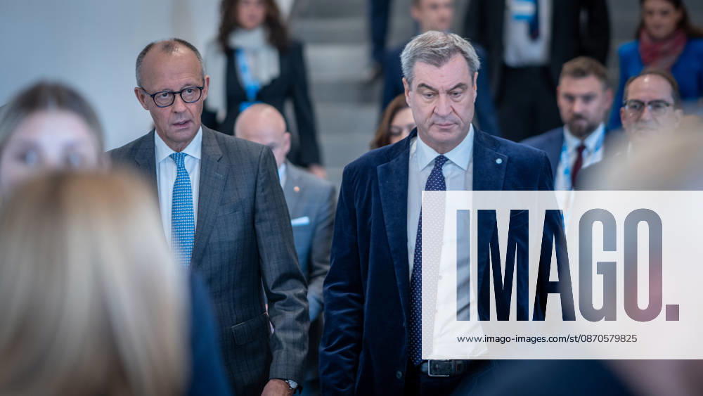 Chancellor Friedrich Merz speaks here alongside CSU Party Chairman Markus Söder on their way to Exhibition Hall C6 at the CSU Party Convention in Munich, Munich, Bavaria, Germany, Munich Exhibition Center