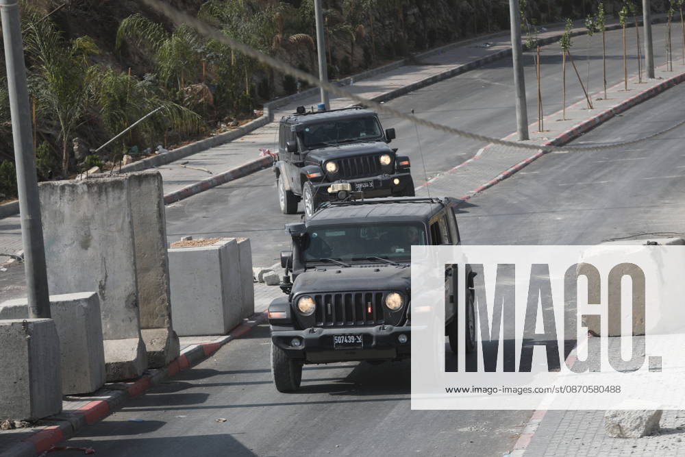 Israeli Soldiers and Military Vehicles Deployed Near Checkpoint in Hebron Israeli soldiers and military vehicles are deployed near a checkpoint where a shooting attack took place in the West Bank city of Hebron, on October 24, 2026. The deployment comes amid continuing Israeli military operations and heightened security measures in the area. Photo by Mamoun Wazwaz apaimages Hebron West Bank Palestinian Territory 241026_Hebron_MW_04(17)