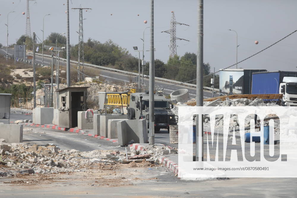 Israeli Soldiers and Military Vehicles Deployed Near Checkpoint in Hebron Israeli soldiers and military vehicles are deployed near a checkpoint where a shooting attack took place in the West Bank city of Hebron, on October 24, 2026. The deployment comes amid continuing Israeli military operations and heightened security measures in the area. Photo by Mamoun Wazwaz apaimages Hebron West Bank Palestinian Territory 241026_Hebron_MW_04(2)