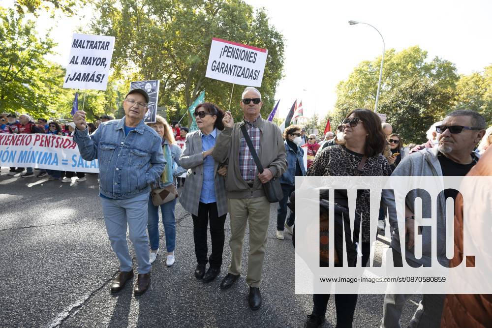 Several people carrying signs in favor of public pensions take part in a demonstration supporting the public pension system and access to housing in Madrid, Spain. Madrid Spain - ZUMAs197 20261024_aaa_s197_060