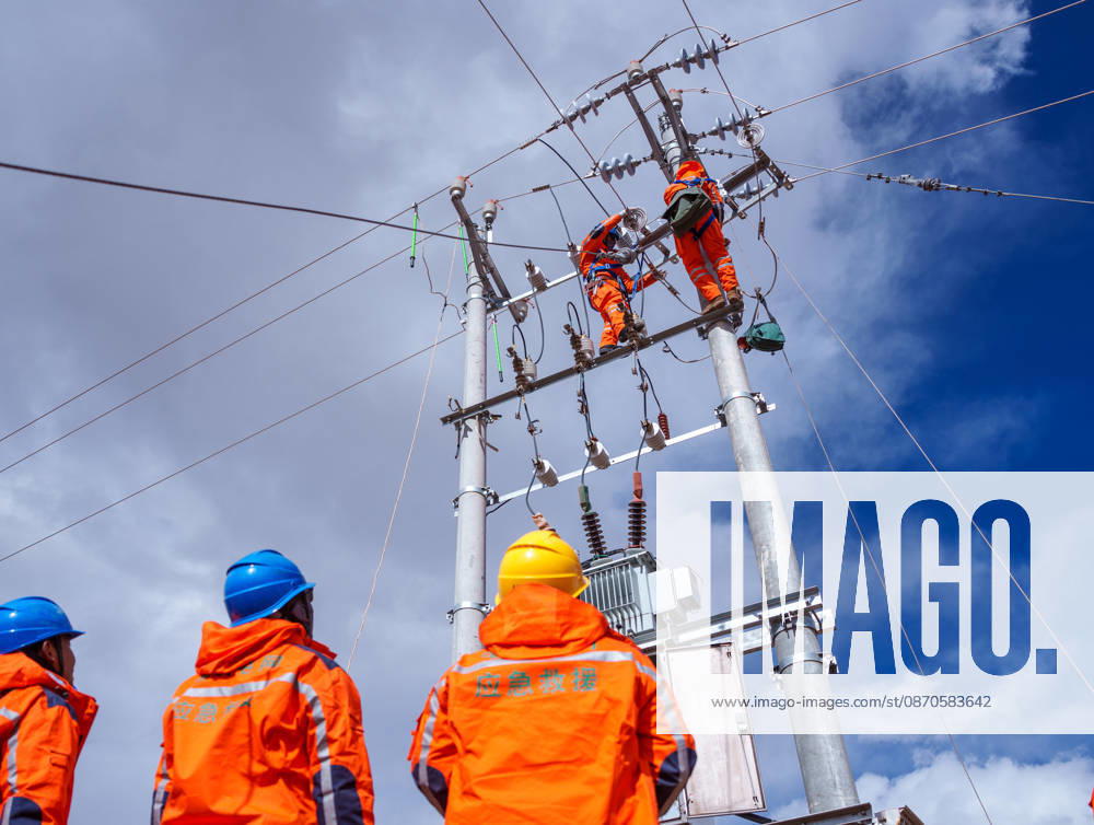 (261024) -- NAGQU, Oct. 24, 2026 -- Power workers operate to ensure power supply at a quake-hit village in Maru Township of Baqen County, Nagqu City, southwest China s Xizang Autonomous Region, Oct. 24, 2026. As of 11 a.m. Saturday, 52,450 items or sets of disaster relief supplies had been sent to the quake zone, while more than 2,500 rescue personnel were engaged in relief operations. Authorities have established 35 temporary resettlement sites in the disaster zone. Medical treatment and public health and epidemic prevention efforts are proceeding in an orderly manner, according to the local emergency command headquarters. ) (SpotNews) CHINA-XIZANG-NAGQU-EARTHQUAKE-RELIEF WORK (CN) TenzinxNyida