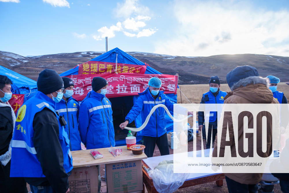 (261024) -- NAGQU, Oct. 24, 2026 -- A volunteer makes noodles at a quake-hit village in Maru Township of Baqen County, Nagqu City, southwest China s Xizang Autonomous Region, Oct. 24, 2026. As of 11 a.m. Saturday, 52,450 items or sets of disaster relief supplies had been sent to the quake zone, while more than 2,500 rescue personnel were engaged in relief operations. Authorities have established 35 temporary resettlement sites in the disaster zone. Medical treatment and public health and epidemic prevention efforts are proceeding in an orderly manner, according to the local emergency command headquarters. ) (SpotNews) CHINA-XIZANG-NAGQU-EARTHQUAKE-RELIEF WORK (CN) TenzinxNyida