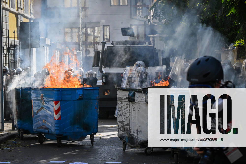 Mass Anti-Government National Protest in Tirana TIRANA, ALBANIA - OCTOBER 24: Thick smoke and intense flames erupt from public trash bins turned into barricades on a central street on October 24, 2026, in Tirana, Albania. Unrest and physical confrontations erupt in Tirana city center as demonstrators and riot police clash during a massive nationwide protest, turning the capital s main avenue into a major flashpoint as chaotic skirmishes broke out between security forces and factions of the crowd. Artur Widak Anadolu Tirana Albania. Editorial use only. Please get in touch for any other usage.