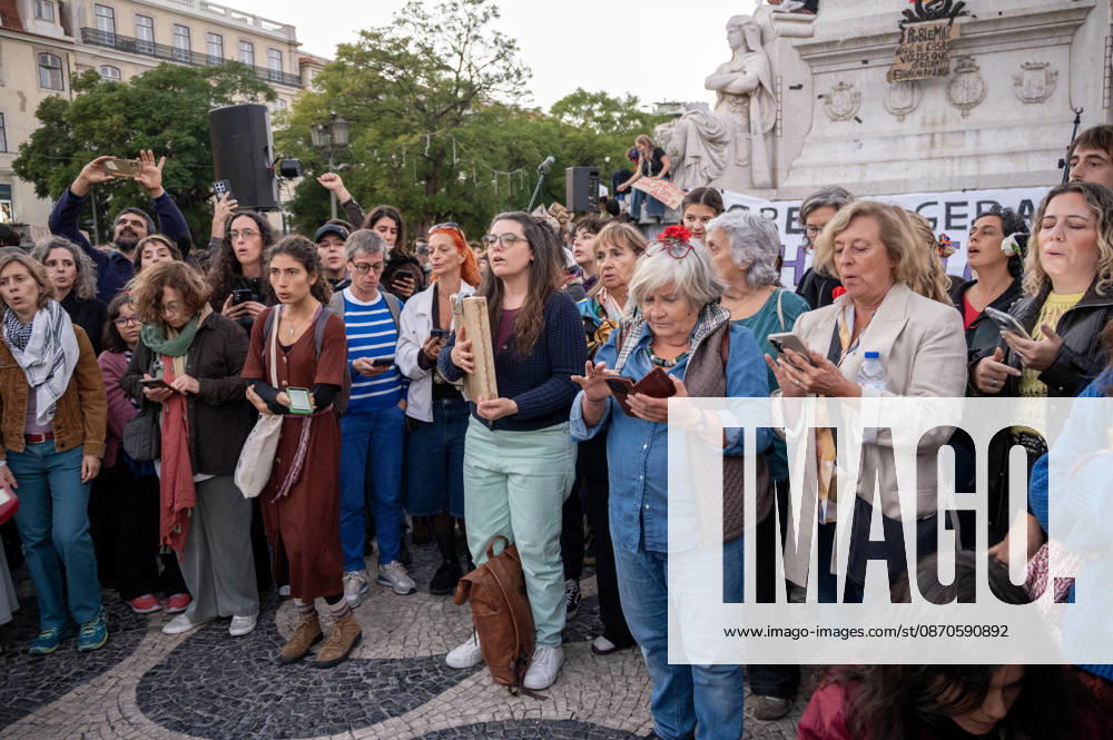 Demonstrators take part in a protest organized by the Acampada de Lisboa housing movement, demanding affordable housing, limits on rising rents and an end to property speculation. The march takes place in central Lisbon, from Marques de Pombal to Rossio Square, following recent police removal of protest tents and the detention of 55 demonstrators during housing protests in the Portuguese capital. Lisbon Portugal - ZUMAr238 20261024_zip_r238_089