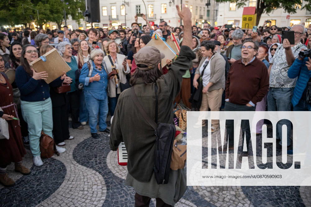 Demonstrators take part in a protest organized by the Acampada de Lisboa housing movement, demanding affordable housing, limits on rising rents and an end to property speculation. The march takes place in central Lisbon, from Marques de Pombal to Rossio Square, following recent police removal of protest tents and the detention of 55 demonstrators during housing protests in the Portuguese capital. Lisbon Portugal - ZUMAr238 20261024_zip_r238_087