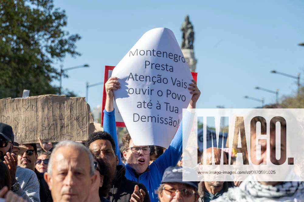 Demonstrators take part in a protest organized by the Acampada de Lisboa housing movement, demanding affordable housing, limits on rising rents and an end to property speculation. The march takes place in central Lisbon, from Marques de Pombal to Rossio Square, following recent police removal of protest tents and the detention of 55 demonstrators during housing protests in the Portuguese capital. Lisbon Portugal - ZUMAr238 20261024_zip_r238_056