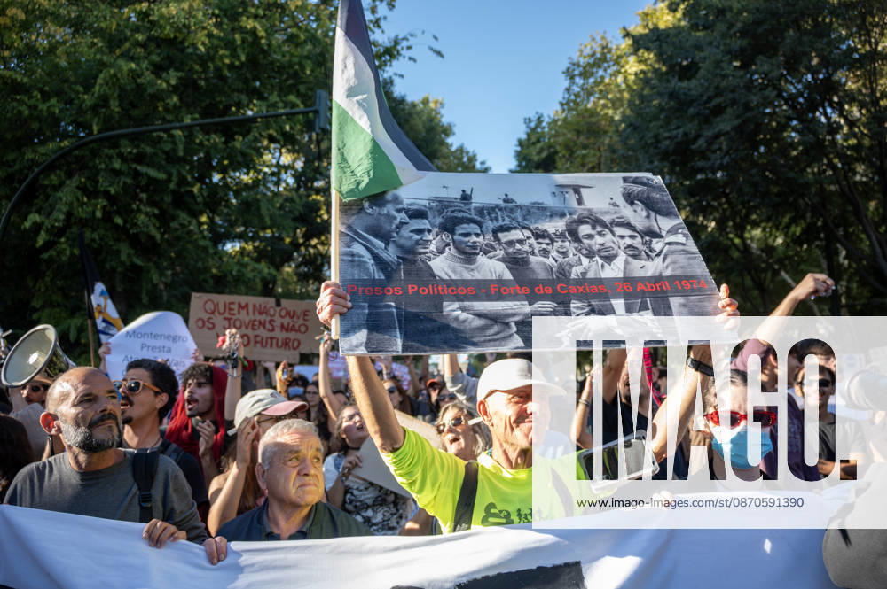 Demonstrators take part in a protest organized by the Acampada de Lisboa housing movement, demanding affordable housing, limits on rising rents and an end to property speculation. The march takes place in central Lisbon, from Marques de Pombal to Rossio Square, following recent police removal of protest tents and the detention of 55 demonstrators during housing protests in the Portuguese capital. Lisbon Portugal - ZUMAr238 20261024_zip_r238_030