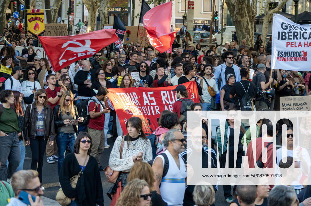 Demonstrators take part in a protest organized by the Acampada de Lisboa housing movement, demanding affordable housing, limits on rising rents and an end to property speculation. The march takes place in central Lisbon, from Marques de Pombal to Rossio Square, following recent police removal of protest tents and the detention of 55 demonstrators during housing protests in the Portuguese capital. Lisbon Portugal - ZUMAr238 20261024_zip_r238_041