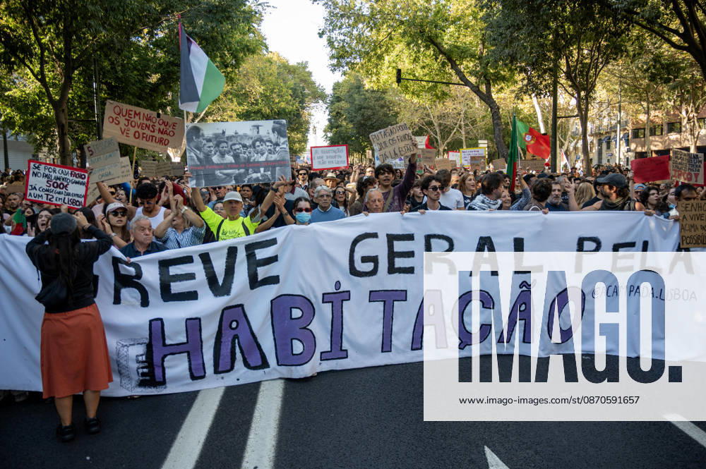 Lisbon, Portugal. 24 October 2026. Demonstrators take part in a protest organized by the Acampada de Lisboa housing movement, demanding affordable housing, limits on rising rents and an end to property speculation. The march takes place in central Lisbon, from Marques de Pombal to Rossio Square, following recent police removal of protest tents and the detention of 55 demonstrators during housing protests in the Portuguese capital. Lisbon Portugal - ZUMAr238 20261024_zip_r238_045