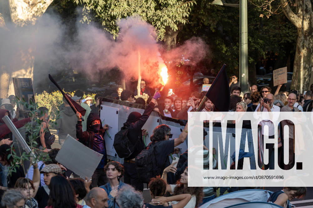 Demonstrators take part in a protest organized by the Acampada de Lisboa housing movement, demanding affordable housing, limits on rising rents and an end to property speculation. The march takes place in central Lisbon, from Marques de Pombal to Rossio Square, following recent police removal of protest tents and the detention of 55 demonstrators during housing protests in the Portuguese capital. Lisbon Portugal - ZUMAr238 20261024_zip_r238_049
