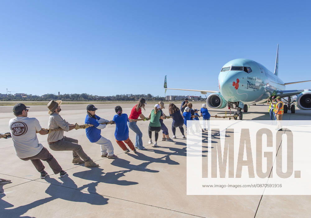 Teams compete in the 5th annual Alpha Resource Center Plane Pull, trying to pull a 140,000-pound Alaska Airlines 737 jetliner 20 feet in the fastest time. The event is a fundraiser for the Alpha Resource Center, a nonprofit serving people with disabilities and their families. Santa Barbara USA - ZUMAh13_ 20261024_zaf_h13_006