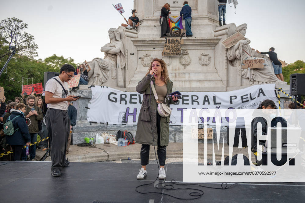 Demonstrators take part in a protest organized by the Acampada de Lisboa housing movement, demanding affordable housing, limits on rising rents and an end to property speculation. The march takes place in central Lisbon, from Marques de Pombal to Rossio Square, following recent police removal of protest tents and the detention of 55 demonstrators during housing protests in the Portuguese capital. Lisbon Portugal - ZUMAr238 20261024_zip_r238_029