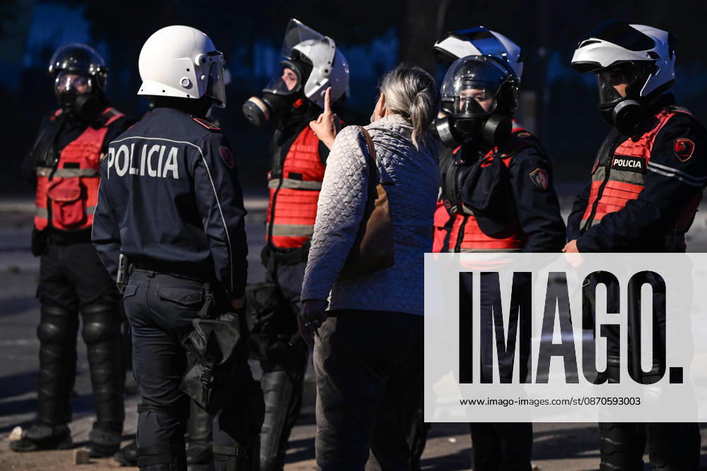 Mass Anti-Government National Protest in Tirana TIRANA, ALBANIA - OCTOBER 24: A local woman gesticulates and addresses a group of heavily equipped riot police officers on a street on October 24, 2026, in Tirana, Albania. Unrest and physical confrontations erupt in Tirana city center as demonstrators and riot police clash during a massive nationwide protest, turning the capital s main avenue into a major flashpoint as chaotic skirmishes broke out between security forces and factions of the crowd. Artur Widak Anadolu Tirana Albania. Editorial use only. Please get in touch for any other usage.